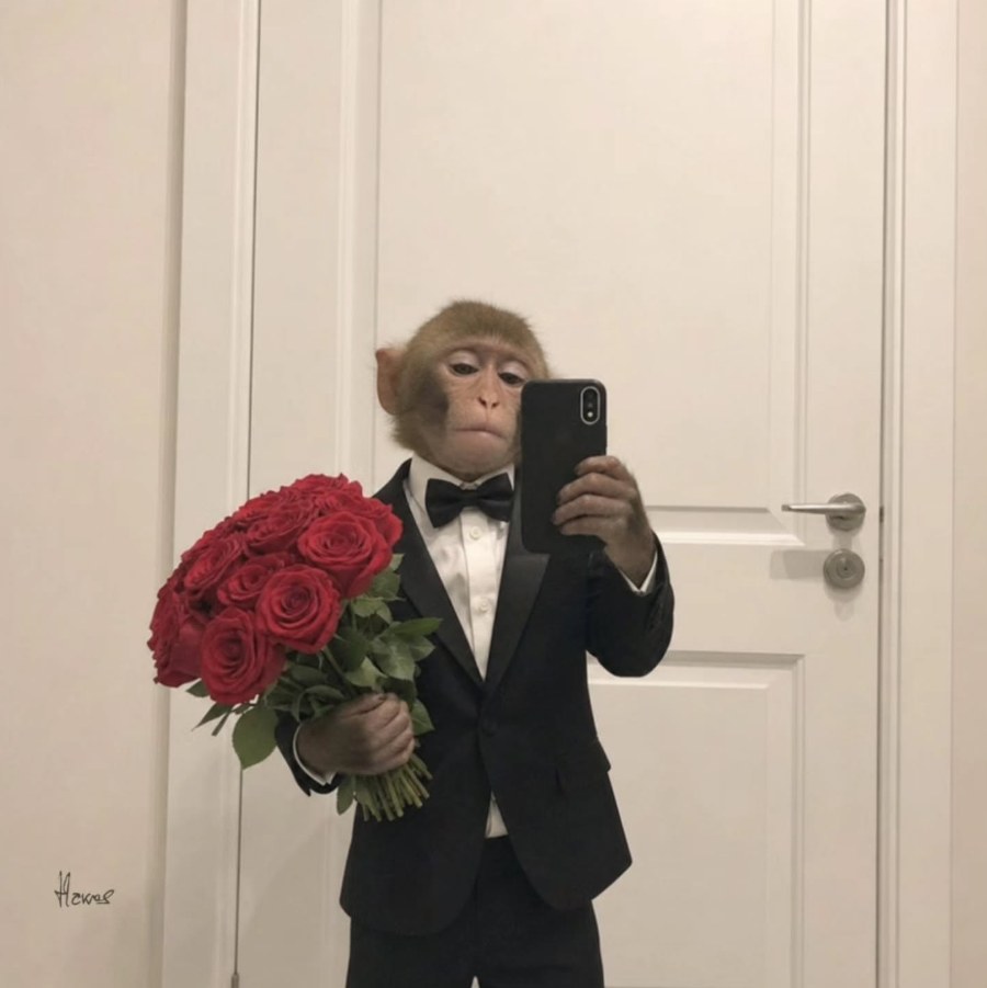 Arthur in a tuxedo holding roses